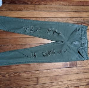 AMERICAN EAGLE RIPPED SKINNY JEANS